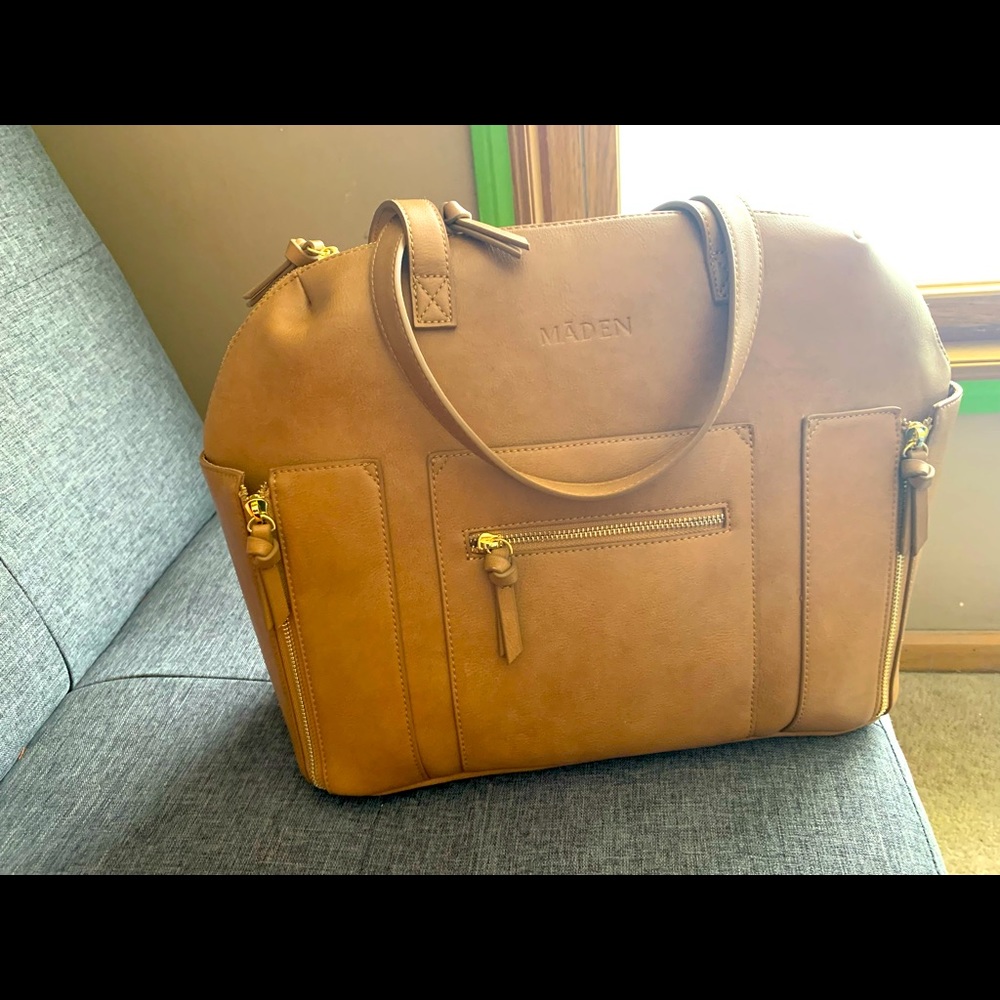 Camel colored tote ; diaper bag or day bag for a women or even travel. 
I